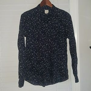 Navy button up shirt with white floral pattern